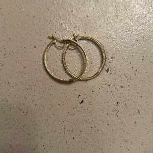 Gold hoop earrings never wore before
